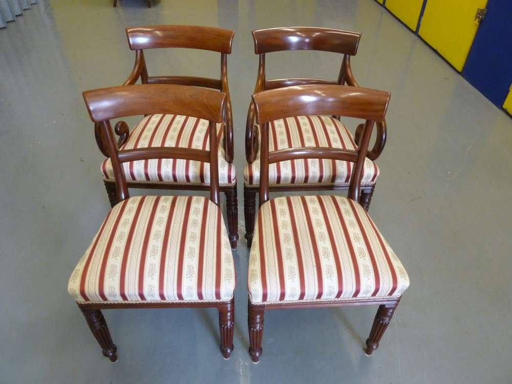 Set of four Regency style mahogany chairs to include two carvers