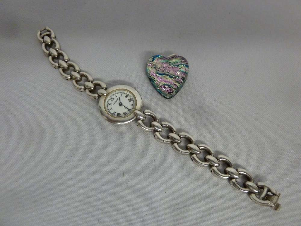 Accurist ladies wristwatch and a heart shaped pendant