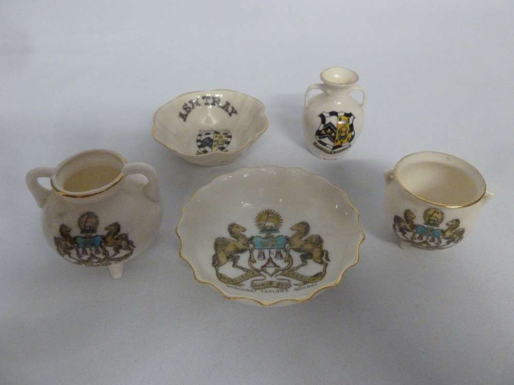 Four Merchant Taylor School Goss porcelain receptacles and one Arcadian