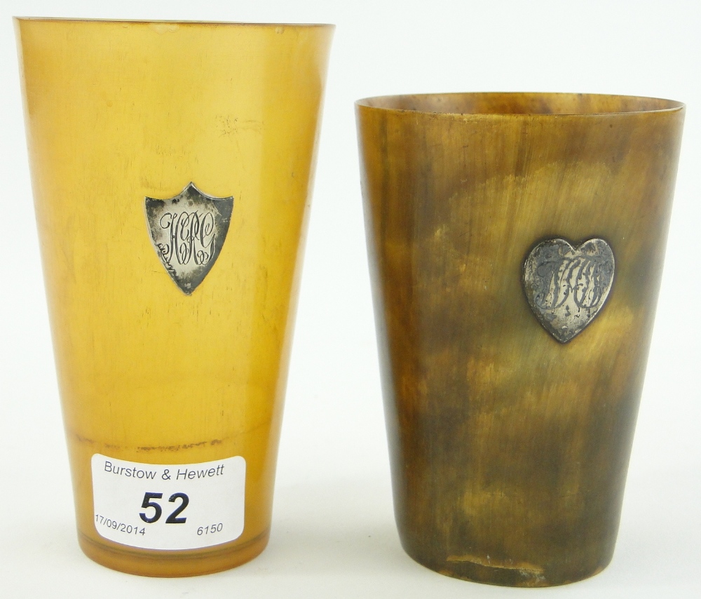 A Victorian horn beaker with heart shaped silver plaque dated 1899, 4.25" and another with silver