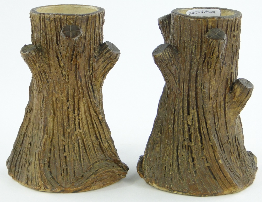 A pair of early Doulton Lambeth tree trunk design vases, 7".