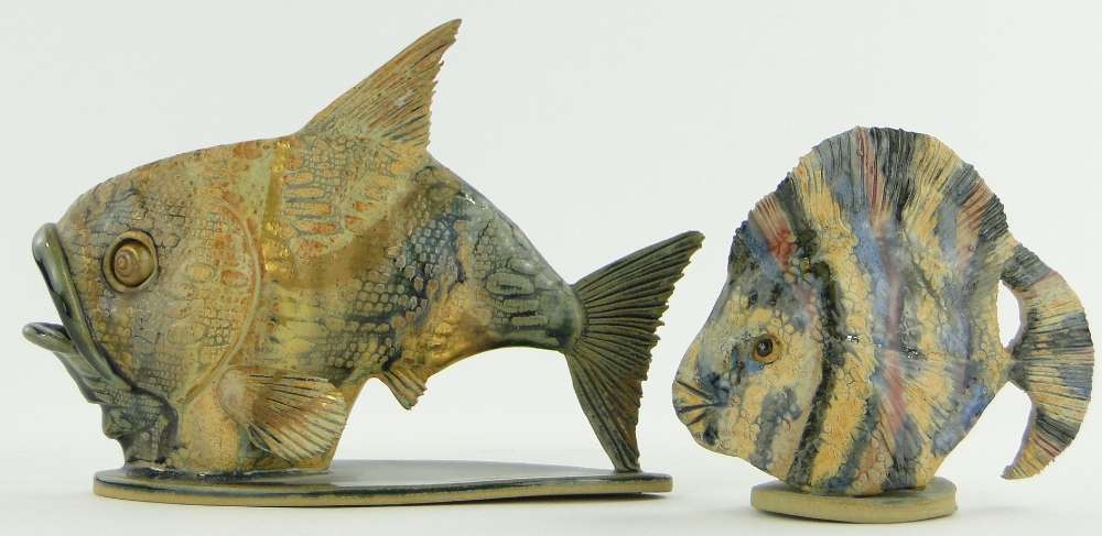 A painted and gilded Studio Pottery fish, height 5.75" and a rainbow fish.