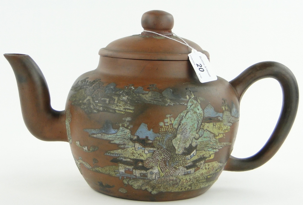 A terracotta wine pot and cover with enamelled decoration, height 8.75".