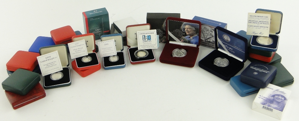 Quantity of Royal Mint and other cased proof silver coins.