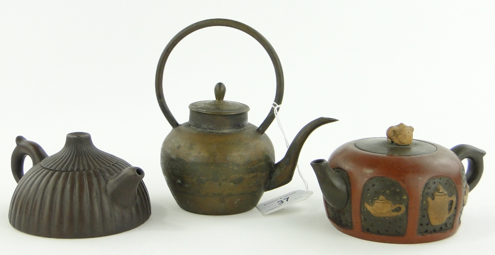 A Chinese teapot with teapot design panels, height 3" and 2 other small teapots, (3).