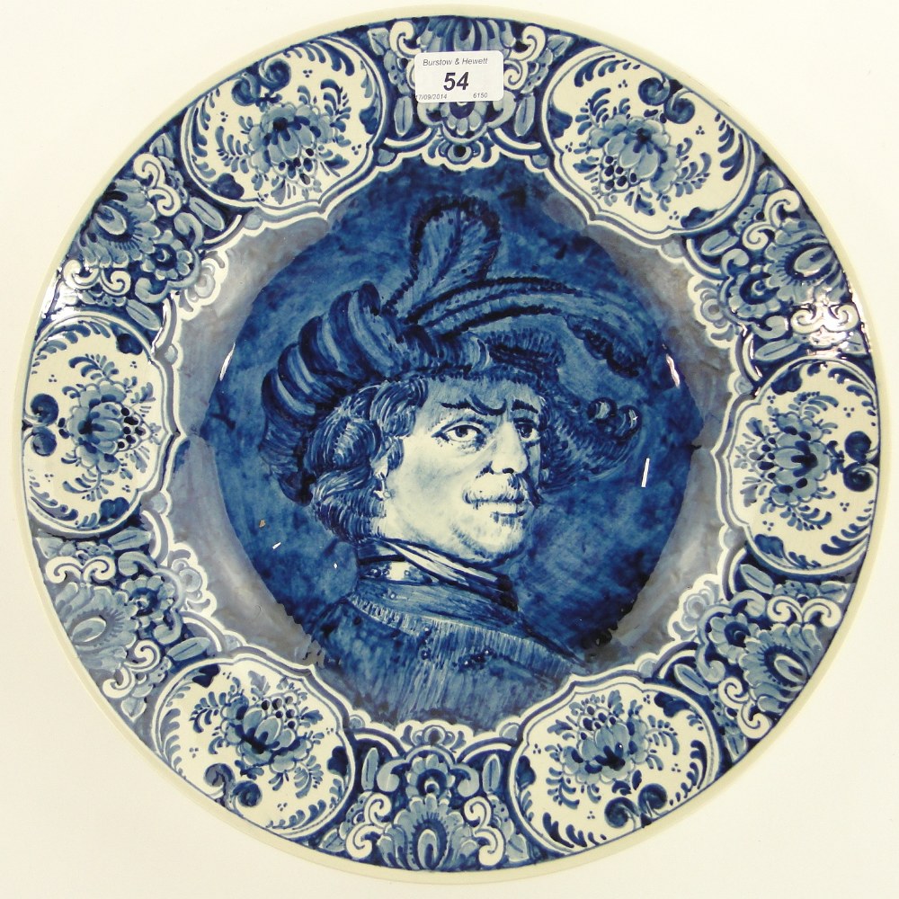 A Delft blue and white charger depicting Rembrandt, 14.5".