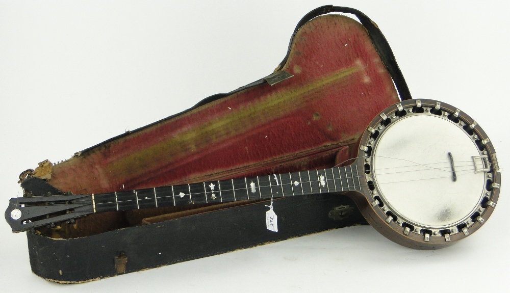 A "New Windsor Patent" banjo in case.
