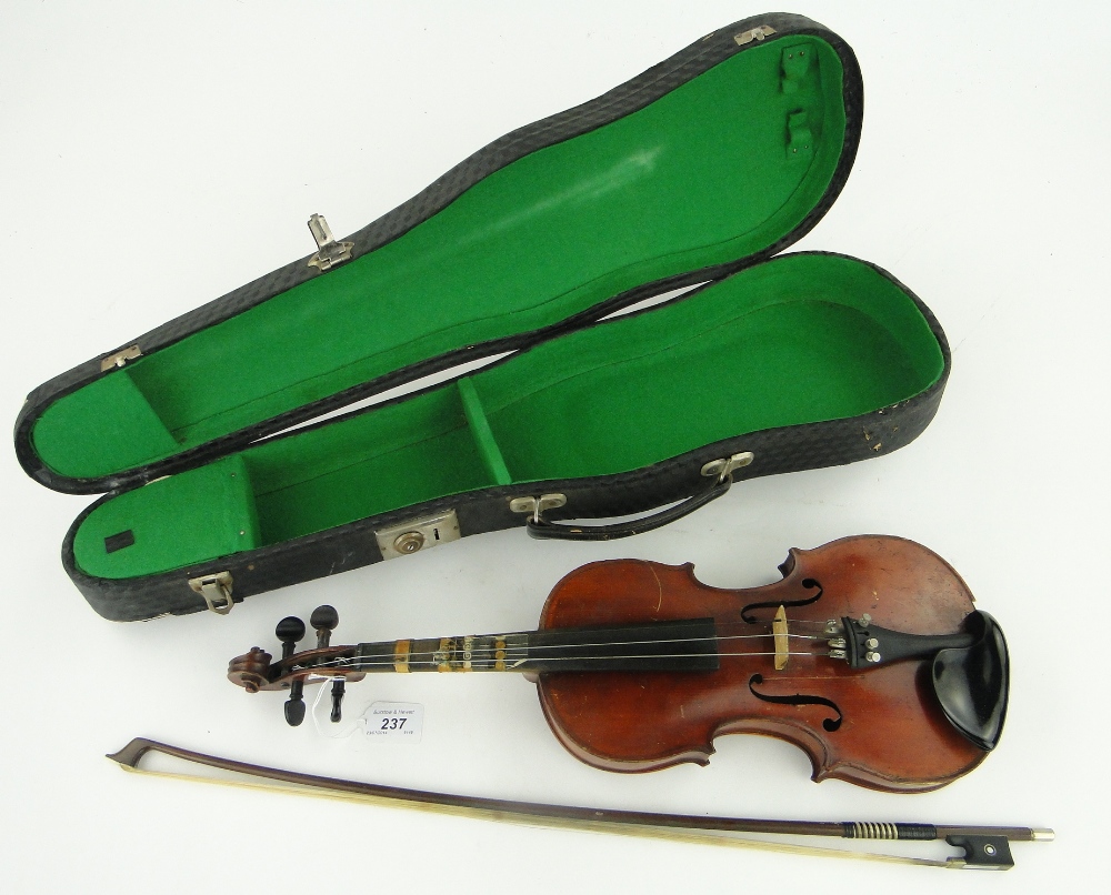 A violin and bow in case.