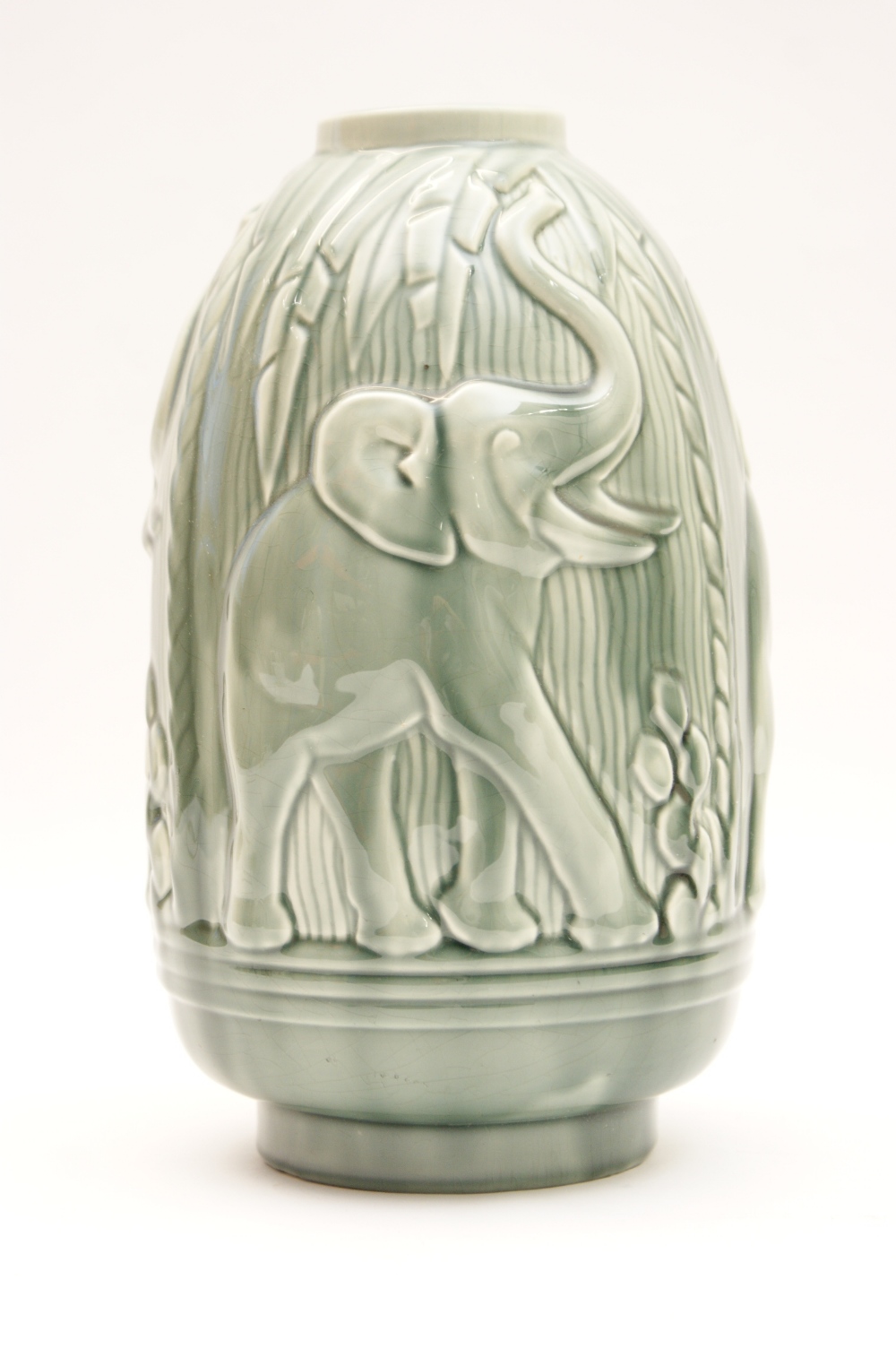 Boch Freres relief moulded vase in Art Deco style, decorated with African elephants with a grey