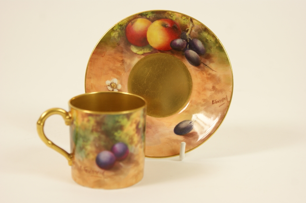 Royal Worcester fruit decorated coffee can and saucer by E Townsend, circa 1930, decorated with