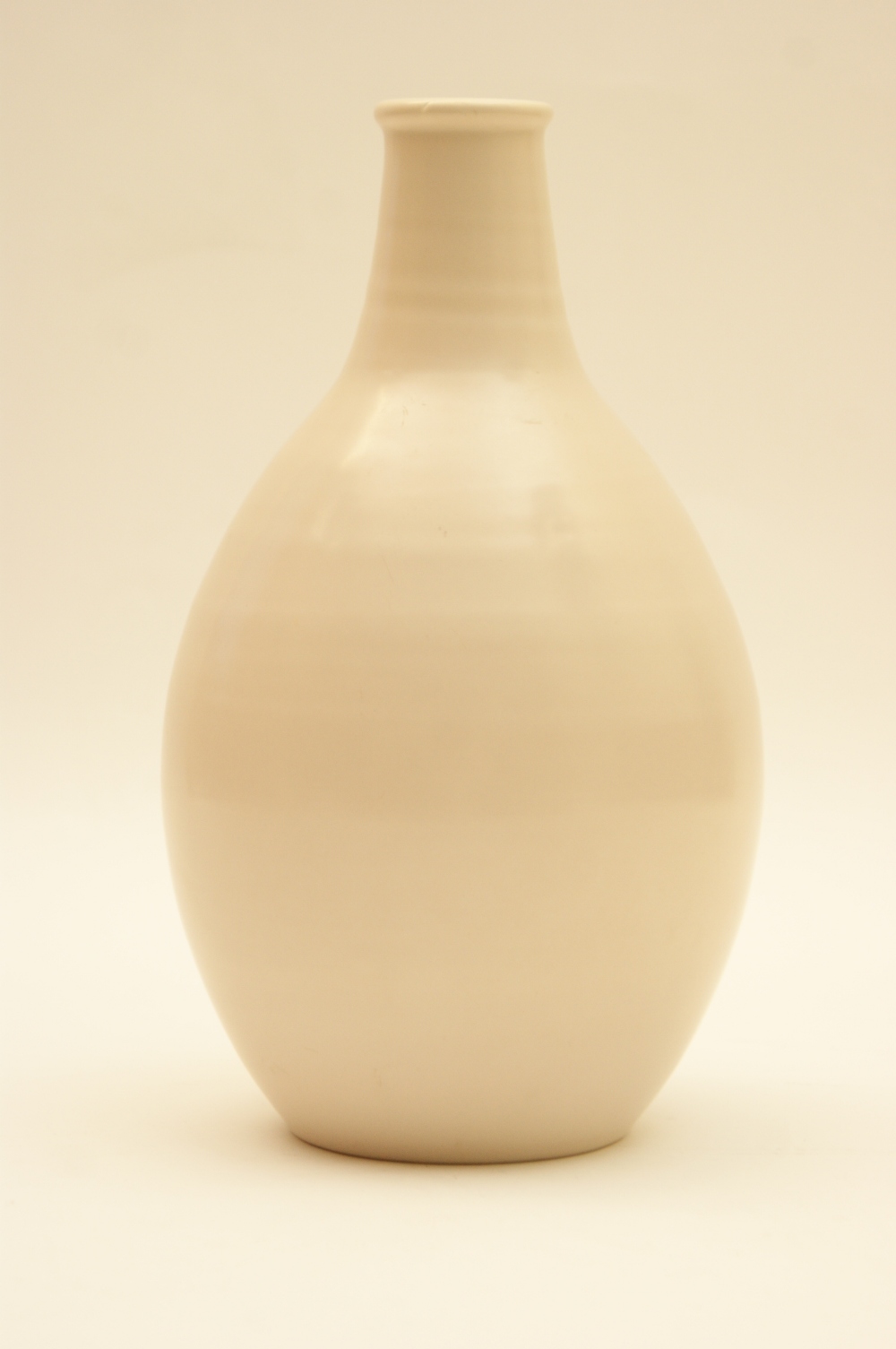 Poole studio vase, ovoid form with short neck and decorated in a plain mushroom glaze, 25cm