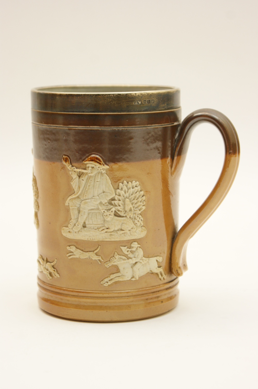 Royal Doulton hunting ware tankard, with silver mount, hallmarked Sheffield 1914, two tone brown