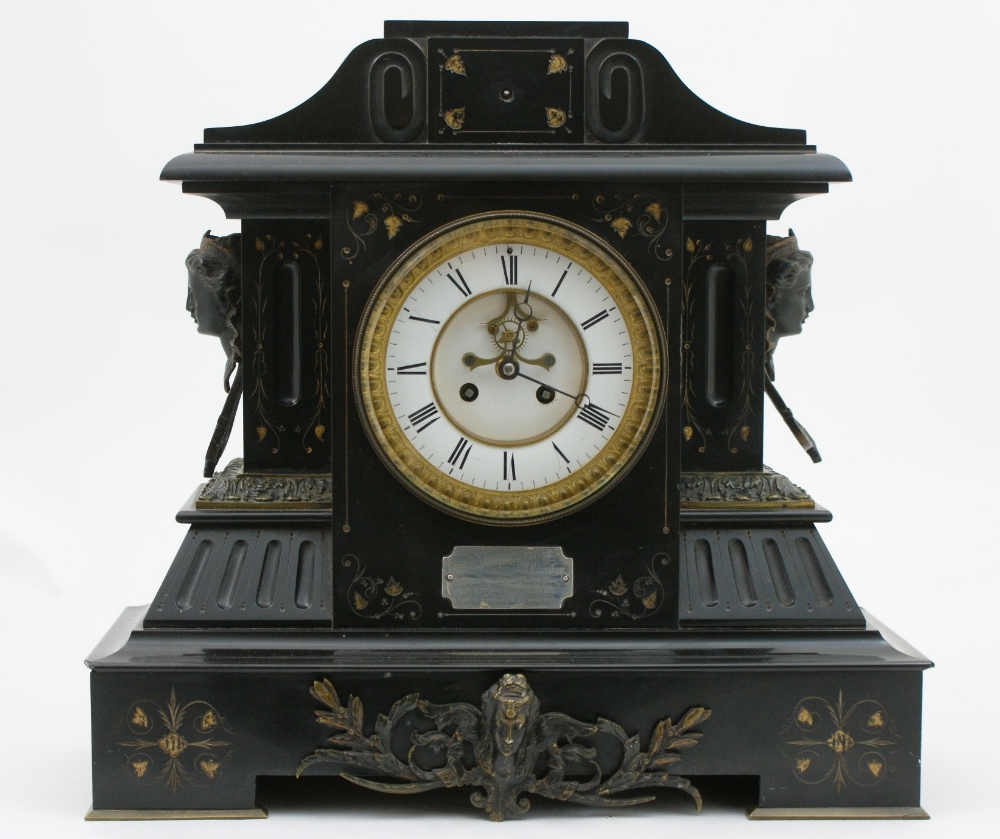 J Marti et Cie, French polished slate architectural mantel clock, white enamelled dial with Roman