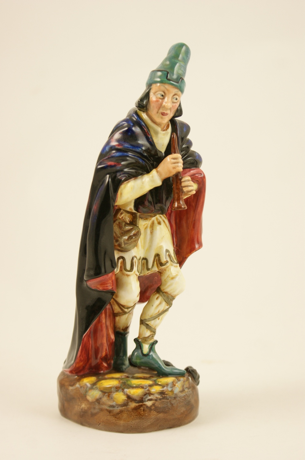 Royal Doulton figure The Pied Piper (HN2102), designed by L Harradine, issued 1953-76, 22cm