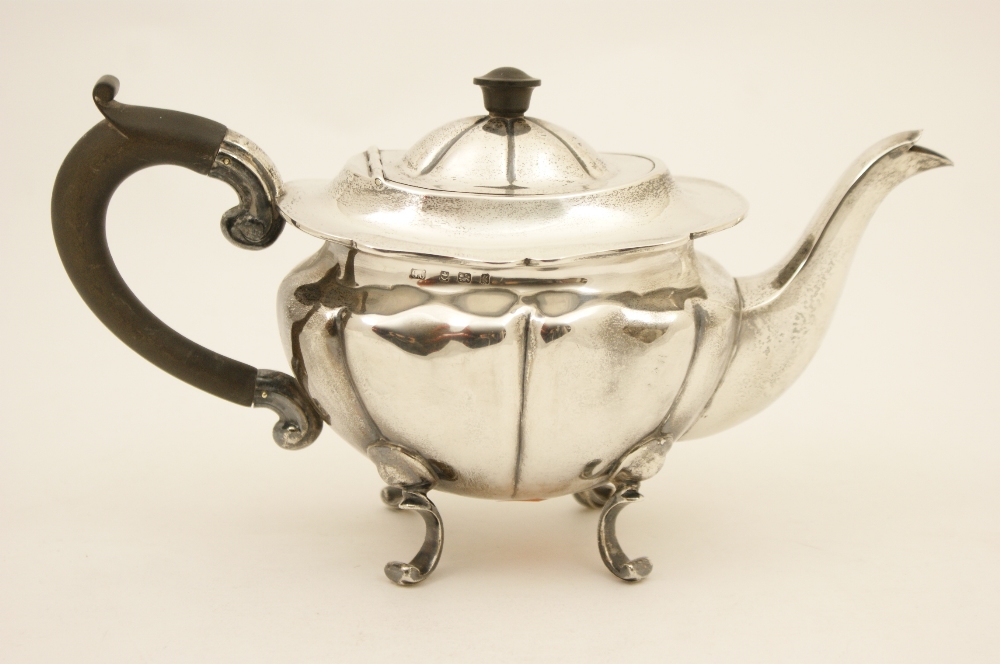 Edwardian silver teapot, maker GU (probably George Unite), Birmingham 1906, lobed form with shaped