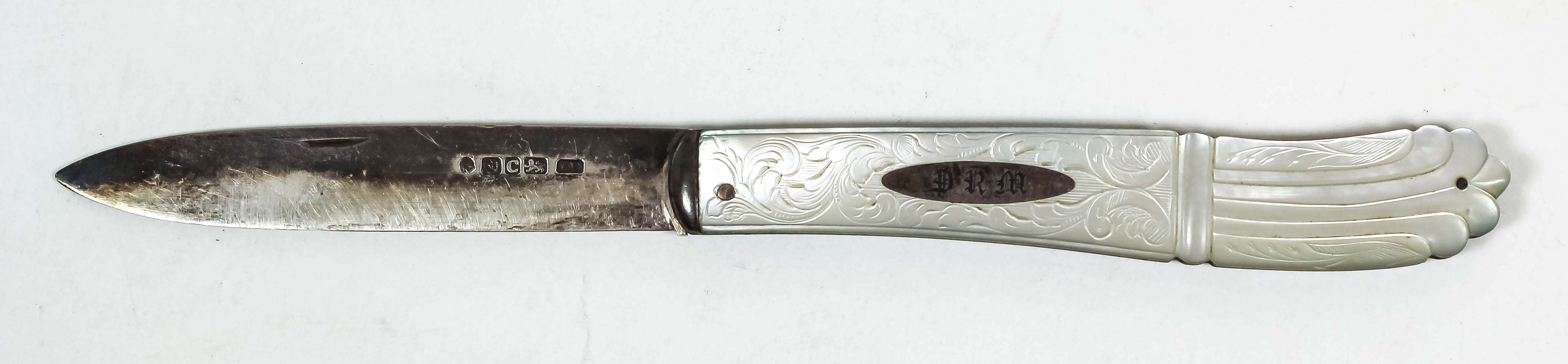 A George IV silver and mother of pearl handled pocket fruit knife, the pistol grip handle engraved