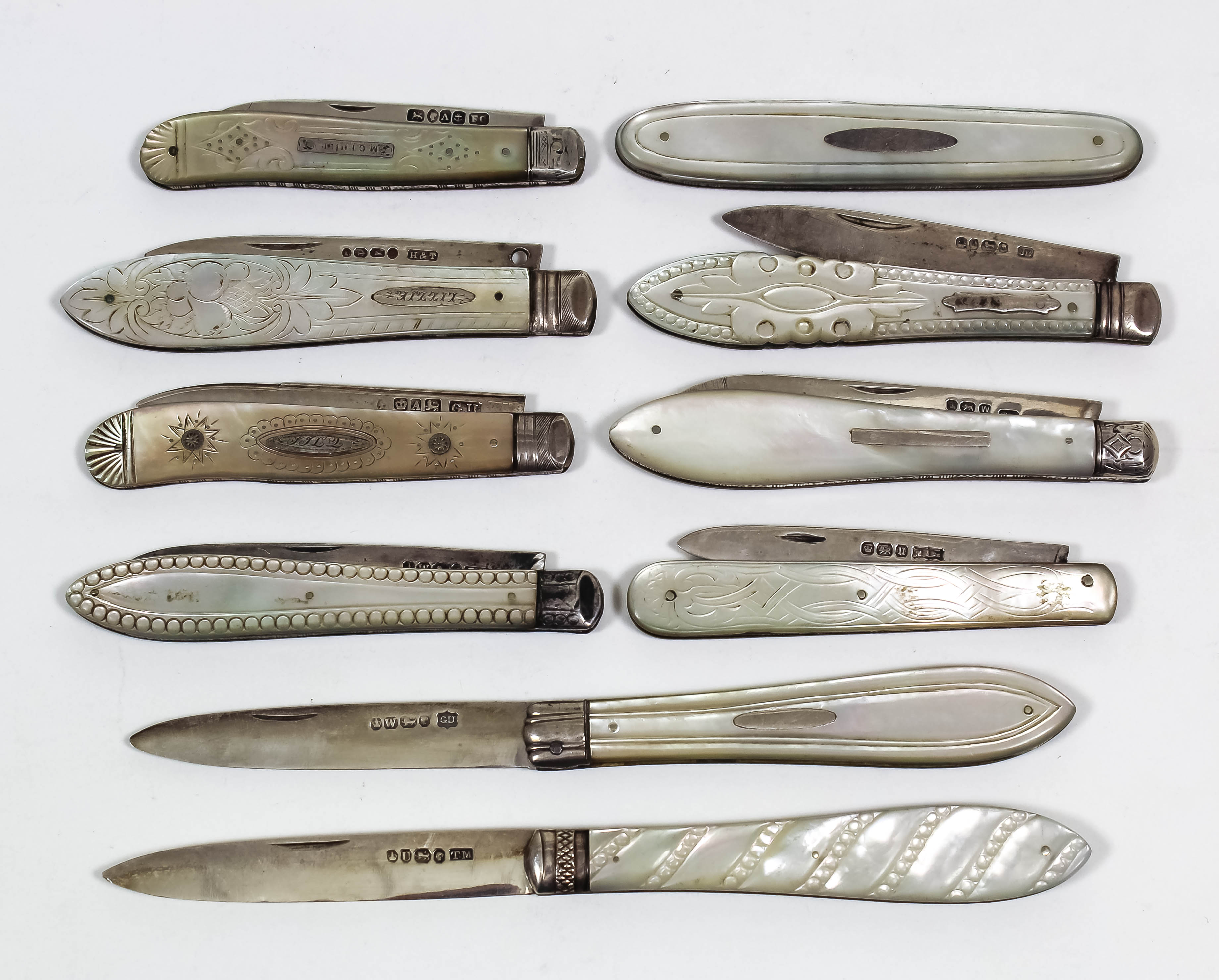 A Victorian silver and mother of pearl handled pocket fruit knife, the handle with reeded and bead