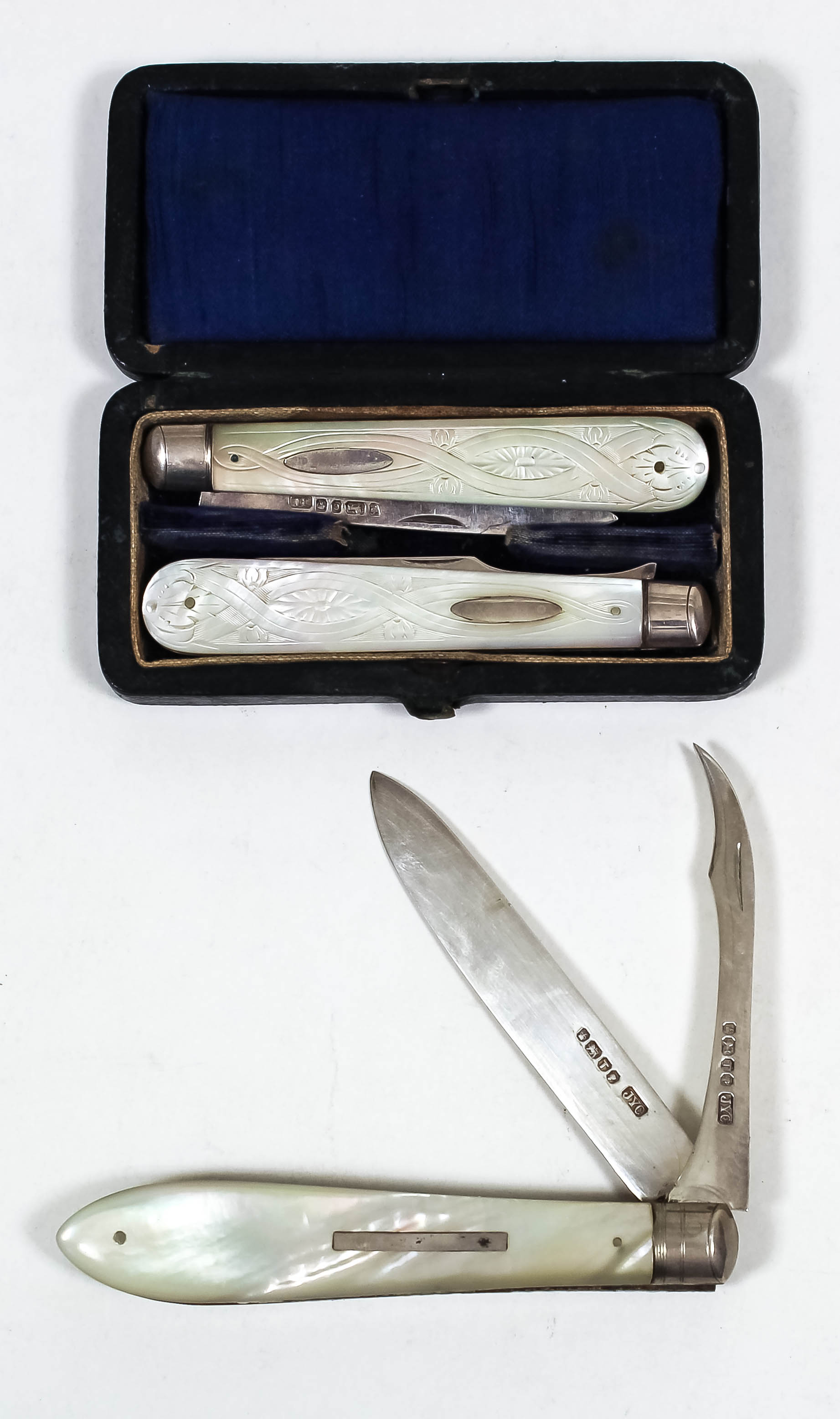 A Victorian silver and mother of pearl handled pocket fruit knife, the plain handle inset with