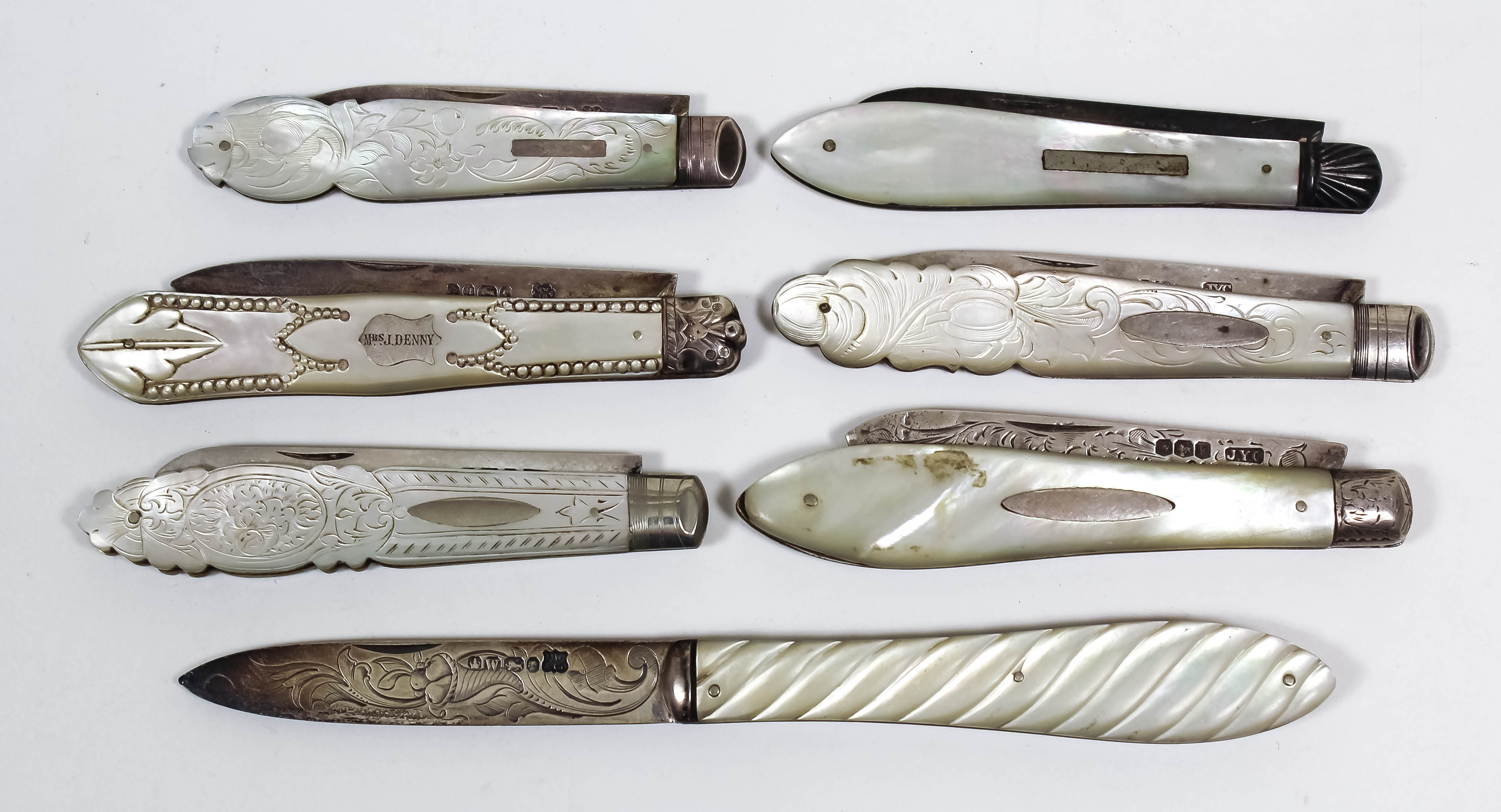 A Victorian silver and mother of pearl handled pocket fruit knife, the blade engraved with