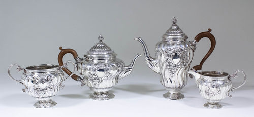 An Edward VII silver four piece tea and coffee service in the manner of Paul De Lamerie (1688-