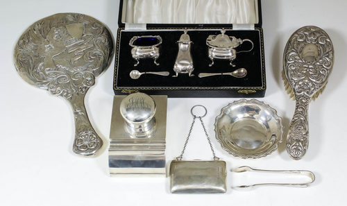 An Edward VII silver rectangular and bow-front inkstand/stamp box inset with inkwell, the fall-