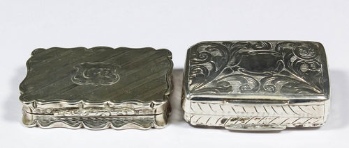 An early Victorian silver rectangular vinaigrette of slightly shaped outline with chevron banded