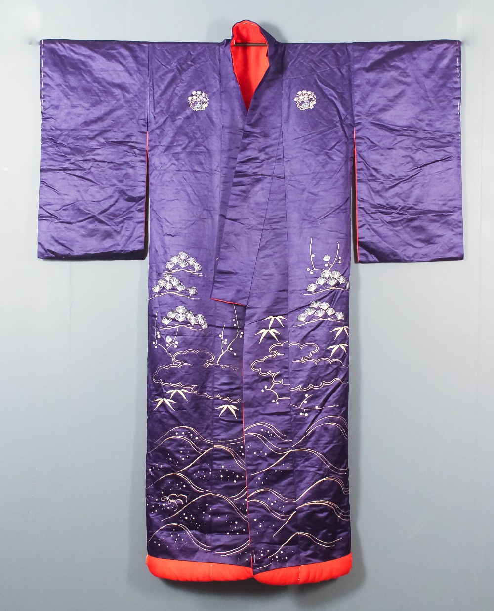 A modern Japanese purple silk kimono with red lining with cranes, turtles, bamboo and prunus,