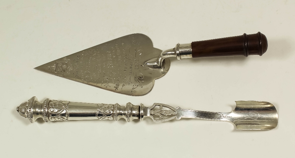 A Victorian silver Stilton cheese scoop, the handle cast with bead and leaf ornament, 9.5ins