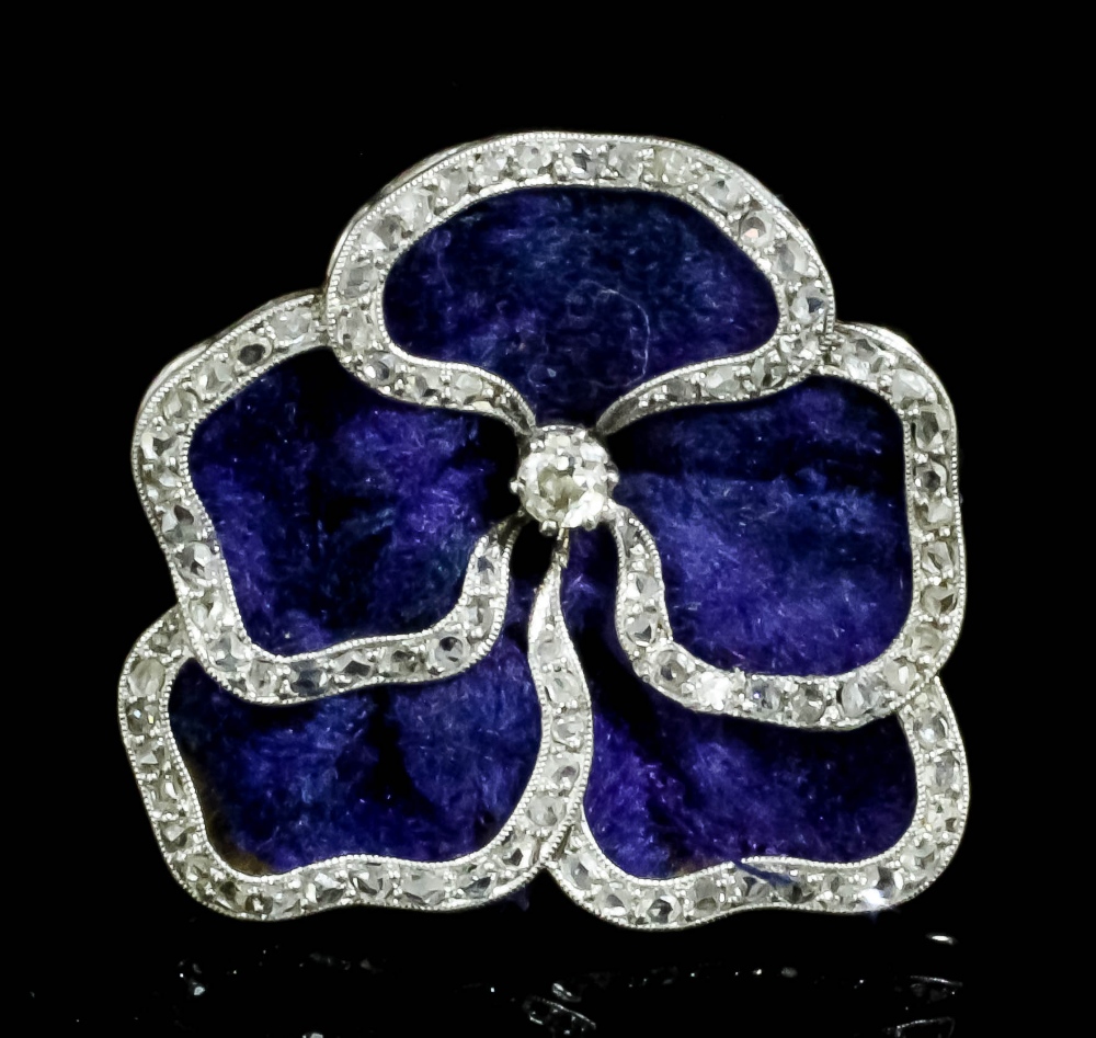 An early 20th Century gold and silvery coloured metal all diamond set pansy pattern brooch in the