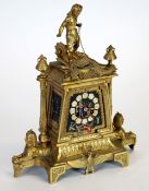 AN UNUSUAL LATE NINETEENTH CENTURY FRENCH GILT BRASS PORCELAIN INSET MANTEL CLOCK in the Egyptian