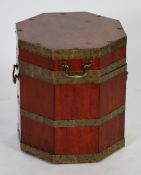 LATE GEORGIAN STYLE MAHOGANY AND BRASS BOUND CELLERETTE, of ocatagonal form with hinged cover,