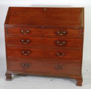 GEORGE III MAHOGANY BUREAU, of typical form, with two short and three long graduated and cockbeaded