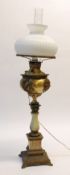 EARLY TWENTIETH CENTURY ONYX AND BRASS OIL TABLE LAMP, the vase shaped column with Corinthian