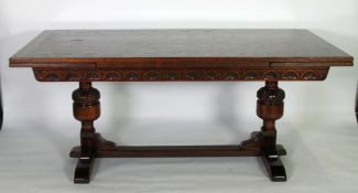 20th CENTURY CARVED OAK DRAW LEAF RECTORY TABLE, the oblong top above a lunette carved frieze,