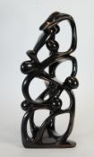 MODERN CARVED BLACK KISII STONE SCULPTURE, modelled as stylised figures, 25"" (63.5cm) high