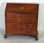 EARLY NINETEENTH CENTURY INLAID MAHOGANY BUREAU, the fall front inlaid with central oval fan and