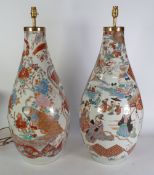 IMPRESSIVE PAIR OF JAPANESE LATE MEIJI PIERCED ARITA PORCELAIN VASES, now adapted as electric lamp
