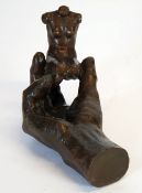 MODERN DALIESQUE PATINATED BRONZE MODELLED AS A HAND SUPPORTING A FEMALE TORSO, 8 1/2"" (21.6cm)