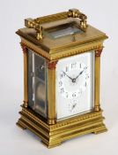 EARLY 20TH CENTURY FRENCH GILT BASS REPEATING CARRIAGE CLOCK WITH ALARM, THE SILVER MASK WITH