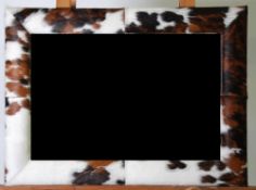 MODERN OBLONG WALL MIRROR,  in cowskin covered frame, 38"" x 28"" (96.5cm x 71.1cm) TOGETHER WITH A