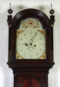 A GEORGE III MAHOGANY LONGCASE CLOCK, the eight day movement with painted arched dial inscribed `