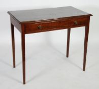 EARLY TWENTIETH CENTURY MAHOGANY WRITING TABLE, the moulded oblong top above a long frieze drawer,