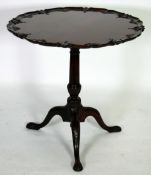 GOOD QUALITY GEORGE III CARVED MAHOGANY TRIPOD TABLE, the circular tilt top with leaf capped