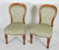 PAIR OF EARLY NINETEENTH CENTURY MAHOGANY SPOON BACKED EASY CHAIRS, the moulded show wood frames