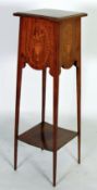 EDWARDIAN MAHOGANY AND MARQUETRY INLAID TORCHERE, the square moulded top above a panelled, inlaid