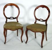 SET OF SIX VICTORIAN CARVED WALNUTWOOD SINGLE DINING CHAIRS, each with a moulded open waisted back,