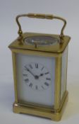 EARLY TWENTIETH CENTURY FRENCH BRASS CORNICHE CASED REPEATER CARRIAGE CLOCK, striking on a coiled