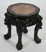 LATE NINETEENTH/EARLY TWENTIETH CENTURY CHINESE CARVED PADOUK AND PINK MARBLE URN STAND, the shaped