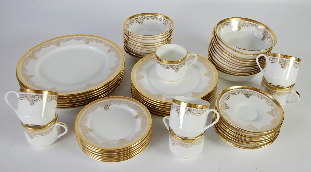 AN AYNSLEY, ST. VINCENT PATTERN PART TEA AND DINNER SERVICE, with gilt scroll borders on a cream