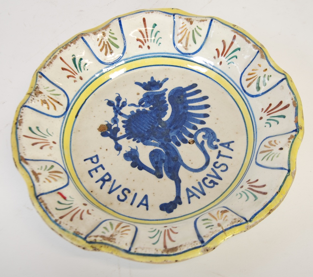 PRESARU, ITALIAN MAIOLICA POTTERY PLATE, of dished form with moulded rim, painted in underglazed